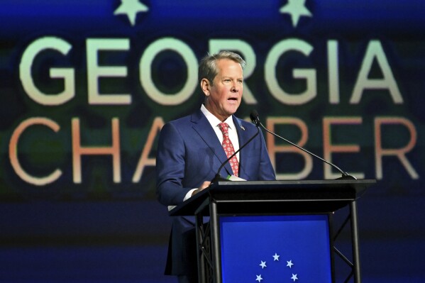 FILE - Georgia Gov. Brian Kemp speaks during Georgia Chamber Congressional Luncheon at The Classic Center, Aug. 8, 2023, in Athens, Ga. Kemp announced on Tuesday, Sept. 12, 2023 that he was suspending the collection of state taxes on unleaded and diesel for a month, citing inflation. (Hyosub Shin/Atlanta Journal-Constitution via AP, file)