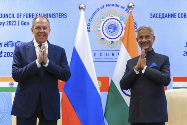 In this handout photo released by Russian Foreign Ministry Press Service, Russian Foreign Minister Sergey Lavrov, left, and India's Foreign Minister Subrahmanyam Jaishankar pose for a photo prior their talks on the sideline of Foreign ministers of the Shanghai Cooperation Organization meeting in India's tourist hotspot Goa, Thursday, May 4, 2023. (Russian Foreign Ministry Press Service via AP)