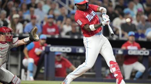 Miami Marlins' Jorge Soler hits a sacrifice fly to score Dane Myers during the fourth inning of a baseball game against the Philadelphia Phillies, Saturday, July 8, 2023, in Miami. (AP Photo/Lynne Sladky)