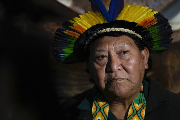 Davi Kopenawa, a Yanomami shaman, listens to reporters' questions during a press conference after his meeting with Pope Francis at the Vatican, Wednesday, April 10, 2024. Kopenawa, a Yanomami shaman, said he came to the Vatican at Francis’ invitation to brief him on the plight of the Yanomami and the Amazon, where deforestation surged to a 15-year high during the previous administration of far-right President Jair Bolsonaro. (AP Photo/Alessandra Tarantino)