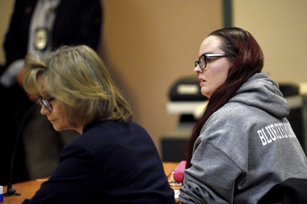 Crystal Sorey, the mother of Harmony Montgomery, sits with her attorney, Sheliah Kaufold, at a hearing for a probate case hearing at Nashua Circuit Court in Nashua, N.H., Monday, March 11, 2024. The mother of Harmony, the little girl who was brutally murdered by her father, Adam Montgomery, was in court to declare her daughter deceased in an attempt to file a wrongful death lawsuit. (David Lane/Union Leader via AP, Pool)