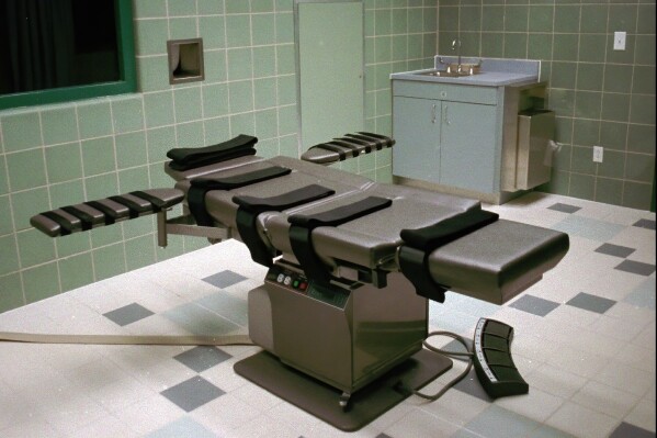 FILE - The interior of the execution chamber in the U.S. Penitentiary in Terre Haute, Ind., is seen, March 22, 1995. Fresh details are emerging three years since 13 historic federal executions were carried out in the final six months of Donald Trump's presidency. (AP Photo/Chuck Robinson, File)