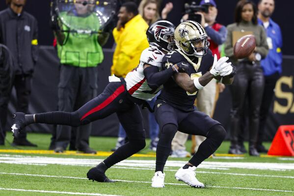 Atlanta Falcons cornerback Dee Alford (37) breaks up a pass intended for New Orleans Saints wide receiver Jarvis Landry (5) in the first half of an NFL football game in New Orleans, Sunday, Dec. 18, 2022. (AP Photo/Butch Dill)