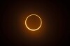 The "ring of fire" annular eclipse during the Albuquerque International Balloon Fiesta in Albuquerque, N.M., on Saturday, Oct. 14, 2023. (Chancey Bush/Albuquerque Journal via AP)