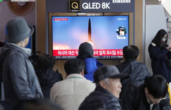 A TV screen shows a file image of North Korea's missile launch during a news program at the Seoul Railway Station in Seoul, South Korea, Monday, March 18, 2024. North Korea fired multiple short-range ballistic missiles toward its eastern waters Monday morning, its neighbors said, days after the end of the South Korean-U.S. military drills that the North views as an invasion rehearsal. (AP Photo/Ahn Young-joon)
