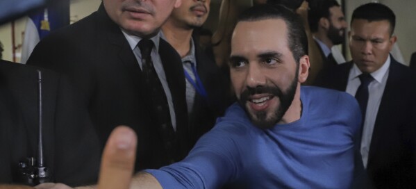 Supporters greet El Salvador's President Nayib Bukele after he presented himself as the presidential candidate for the New Ideas Party in San Salvador, El Salvador, Friday, Oct. 27, 2023. (AP Photo/Salvador Melendez, File)