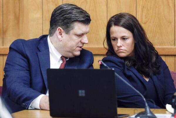 Defense attorneys Chad Frese and Jennifer Frese confer during a hearing for their client Cristhian Bahena Rivera at the Poweshiek County Courthouse in Montezuma, Iowa, on Thursday, July 15, 2021. Bahena Rivera was convicted of killing University of Iowa student Mollie Tibbetts in 2018. A judge delayed Bahena Rivera's sentencing after defense attorneys asserted authorities withheld information about investigations into a nearby sex trafficking ring the lawyers say could have been involved in the fatal stabbing. (Jim Slosiarek/The Gazette, Pool)