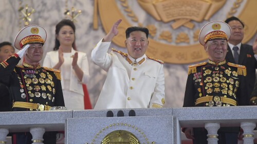 FILE - In this photo provided by the North Korean government, North Korean leader Kim Jong Un, center, watches a military parade to mark the 90th anniversary of North Korea's army at the Kim Il Sung Square in Pyongyang, North Korea on April 25, 2022. Independent journalists were not given access to cover the event depicted in this image distributed by the North Korean government. The content of this image is as provided and cannot be independently verified. Korean language watermark on image as provided by source reads: 