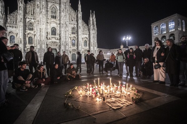 FILE - People attend a candlelight vigil for 22-year-old Giulia Cecchettin, allegedly killed at the hands of her possessive ex-boyfriend, in front of the Milan Duomo Cathedral, Italy, Sunday, Nov. 19, 2023. (Marco Ottico/LaPresse via AP, file)