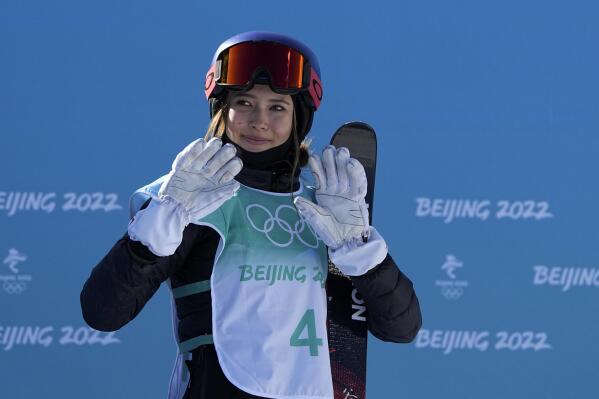 FILE - Eileen Gu, of China, waves after competing during the women's freestyle skiing big air finals of the 2022 Winter Olympics, Feb. 8, 2022, in Beijing. (AP Photo/Jae C. Hong, File)