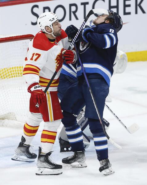 Mangiapane, Zadorov lead way as Flames defeat Jets to keep playoff