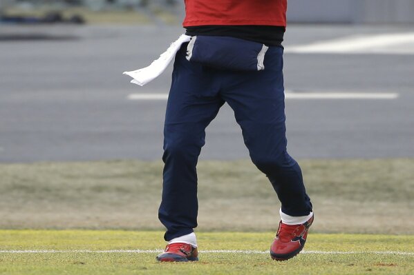 
              New England Patriots quarterback Tom Brady throws the ball while warming up during an NFL football practice, Wednesday, Jan. 16, 2019, in Foxborough, Mass. The Patriots are scheduled to face the Kansas City Chiefs in the AFC championship game, Sunday, Jan. 20, in Kansas City. (AP Photo/Steven Senne)
            