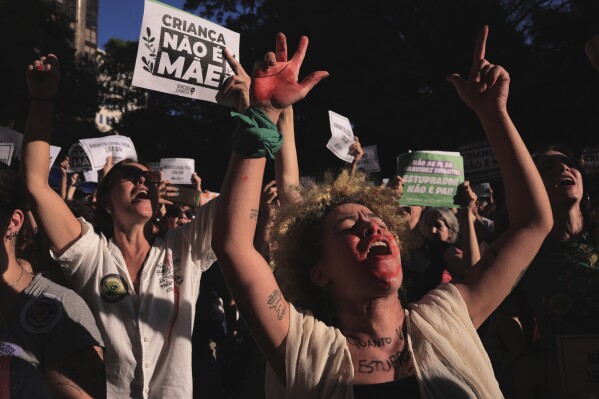 Abortion rights activists march in a ‘A Child Is Not a Mother’ rally against an anti-abortion congressional bill, along Paulista Avenue in Sao Paulo, June 15, 2024. (AP Photo/Ettore Chiereguini, File)