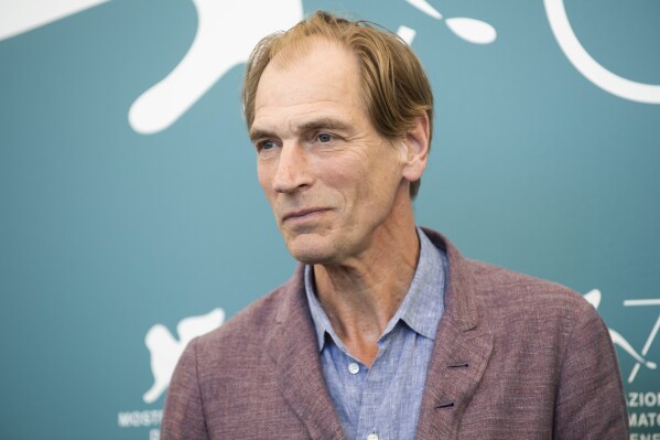 FILE - Actor Julian Sands poses for photographers at the Venice Film Festival in Venice, Italy, on Sept. 3, 2019. Sands, who starred in several Oscar-nominated films in the late 1980s and 90s including “A Room With a View” and “Leaving Las Vegas,” was found dead on a Southern California mountain five months after he disappeared while hiking, authorities said Tuesday, June 27, 2023. (Photo by Arthur Mola/Invision/AP, File)