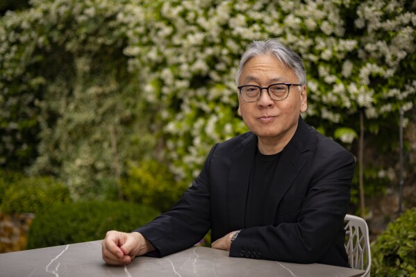 Author Kazuo Ishiguro poses for portrait photographs for the film 'A Pale View of Hills' at the 78th international film festival, Cannes, southern France, Friday, May 16, 2025. (Photo by Joel C Ryan/Invision/AP)