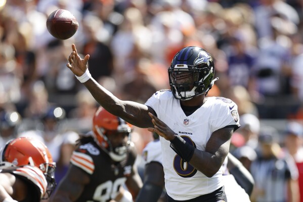 Baltimore Ravens quarterback Lamar Jackson (8) passes during the first half of an NFL football game against the Cleveland Browns, Sunday, Oct. 1, 2023, in Cleveland. (AP Photo/Ron Schwane)