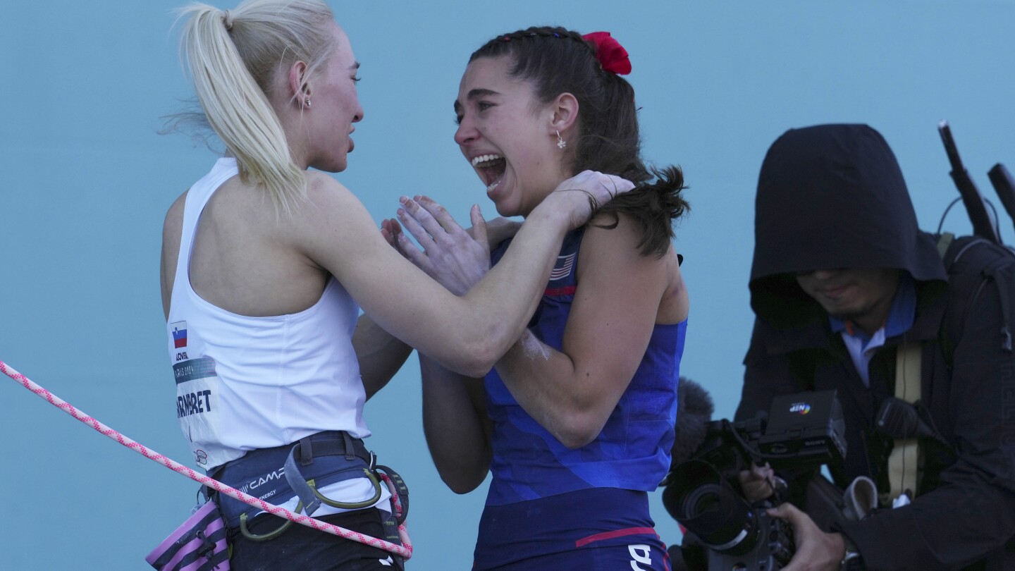 Janja Garnbret defeats American Brooke Raboutou and defends the Olympic gold medal in sport climbing