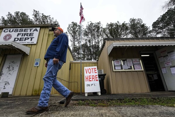 Robert Ward leaves the volunteer fire station in Cusseta, Ala., after voting during a primary election, Tuesday, March 5, 2024. Sixteen states and a U.S. territory hold their 2024 nominating contests on Super Tuesday. (AP Photo/Mike Stewart)