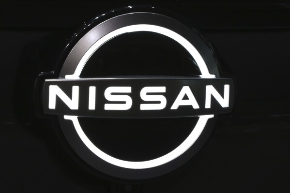 FILE - The Nissan logo is displayed at the global headquarters of Nissan Motor Co., July 22, 2020, in Yokohama, near Tokyo. On Wednesday, May 29, 2024, Nissan urged owners of about 84,000 older vehicles to stop driving them because their Takata air bag inflators have an increased risk of exploding in a crash and hurling dangerous metal fragments. (AP Photo/Koji Sasahara, File)