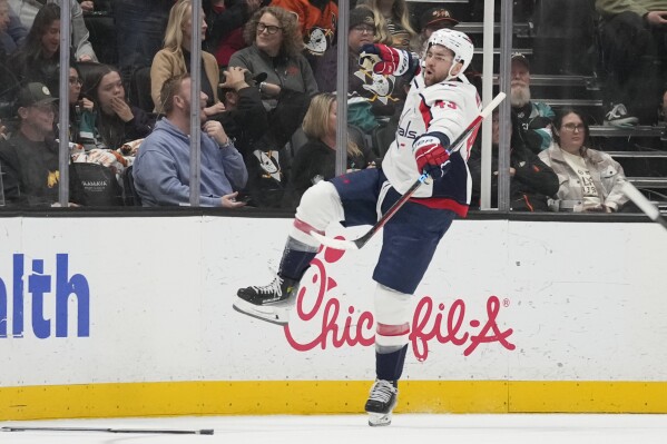 Washington Capitals right wing Tom Wilson (43) celebrates after scoring during the first period of an NHL hockey game against the Anaheim Ducks in Anaheim, Calif., Thursday, Nov. 30, 2023. (AP Photo/Ashley Landis)