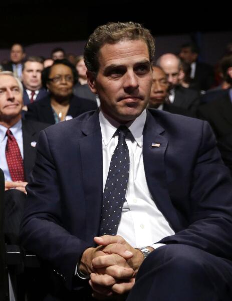 FILE - In this Oct. 11, 2012, file photo Hunter Biden waits for the start of the his father's, Vice President Joe Biden's, debate at Centre College in Danville, Ky. Hunter Biden is expressing regret for being discharged from the Navy Reserve amid published reports that he tested positive for cocaine. The Wall Street Journal reports that Hunter Biden failed the drug test last year and was discharged in February. In a statement issued Thursday, Oct. 16, Biden doesn't say why he was discharged. He says he's embarrassed that his actions led to his discharge and that he respects the Navy's decision.(AP Photo/Pablo Martinez Monsivais, File)