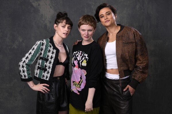 Rose Glass, center, director/co-writer of the film "Love Lies Bleeding," poses with cast members Kristen Stewart, left, and Katy M. O'Brian at the Four Seasons Hotel, Monday, March 4, 2024, in Los Angeles. (AP Photo/Chris Pizzello)