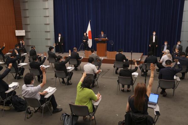 Japan's Prime Minister Fumio Kishida, center, delivers a speech at his official residence in Tokyo Thursday, July 14, 2022. Kishida blamed inadequate police security for the death of former leader Shinzo Abe, who was shot while giving an outdoor campaign speech. (Zhang Xiaoyu/Pool Photo via AP)