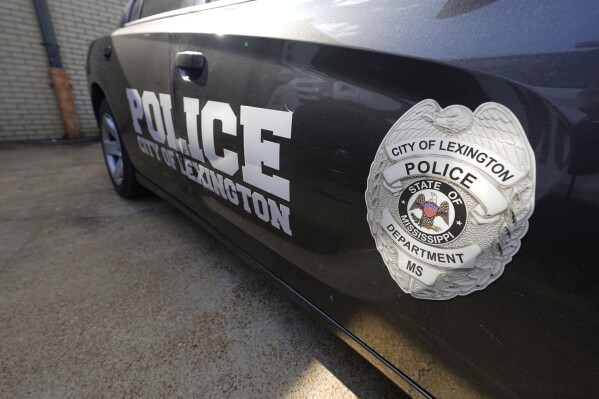 FILE - A Lexington, Miss., police cruiser is parked outside their facility near the town square, Monday, Aug. 15, 2022. The Lexington police department unconstitutionally jailed people for unpaid fines without first assessing whether they could afford to pay them, the U.S. Department of Justice said Thursday, Feb. 29, 2024. (AP Photo/Rogelio V. Solis, File)