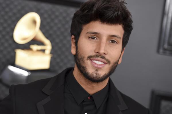FILE - Sebastian Yatra appears at the 62nd annual Grammy Awards in Los Angeles on Jan. 26, 2020. Yatra performs the Oscar nominated song "Dos Oruguitas," in Spanish from "Encanto," written by Lin-Manuel Miranda. (Photo by Jordan Strauss/Invision/AP, File)