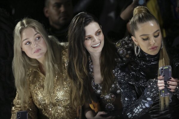 
              Iskra Lawrence, from left, Lydia Hearst and Delilah Belle Hamlin attend The Blonds Runway Show held at Spring Studios during New York Fashion Week on Tuesday, Feb. 12, 2019 in New York. (Photo by Brent N. Clarke/Invision/AP)
            