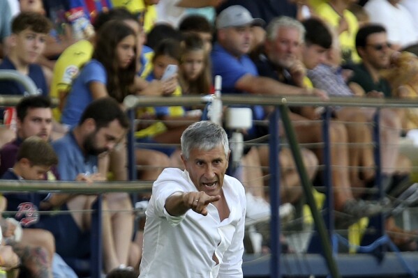 Villarreal's manager Quique Setien gestures during a Spanish La Liga soccer match between Villarreal and Barcelona at the Ceramica stadium in Villarreal, Spain, Sunday, Aug. 27, 2023. (AP Photo/Alberto Saiz)