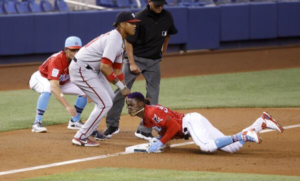 Jose Fernandez pitches Marlins past Nationals 3-2