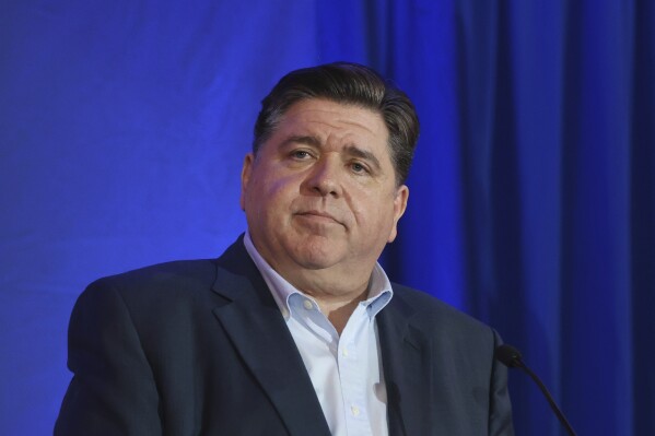 Illinois Gov. JB Pritzker speaks during the McIntyre-Shaheen 100 Club Dinner, Sunday April 27, 2025, in Manchester, N.H. (AP Photo/Reba Saldanha, File)