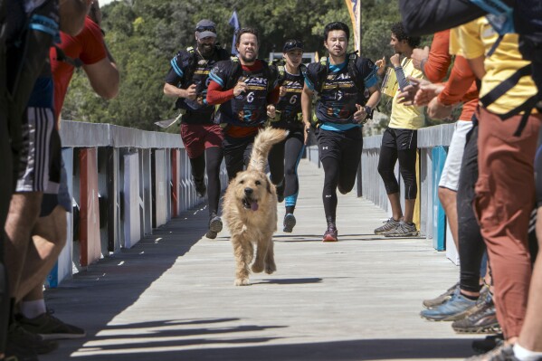 This image released by Lionsgate shows a scene from "Arthur The King." (Carlos Rodriguez/Lionsgate via AP)