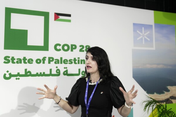 Hadeel Ikhmais, a climate change expert with the Palestinian Authority, speaks to The Associated Press at the COP28 U.N. Climate Summit, Friday, Dec. 1, 2023, in Dubai, United Arab Emirates. (AP Photo/Joshua A. Bickel, File)