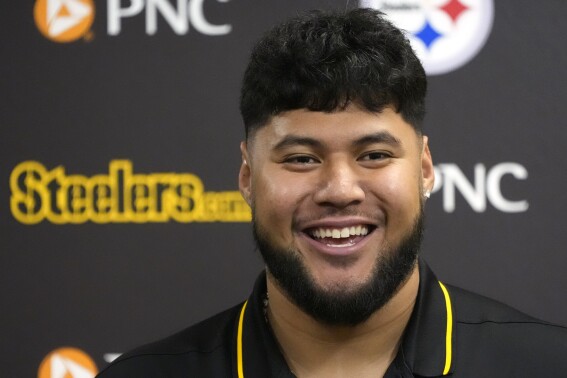 CORRECTS TO FAUTANU NOT FANTANU - Pittsburgh Steelers first round draft pick Troy Fautanu speaks at an NFL football news conference in Pittsburgh, Friday, April 26, 2024. (AP Photo/Gene J. Puskar)