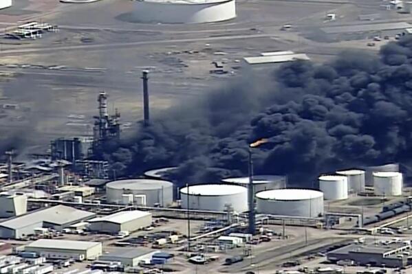 FILE - This aerial image from video provided by KSTP-TV in Minneapolis shows smoke rising from the Husky Energy oil refinery after an explosion, April 26, 2018, at the plant in Superior, Wis. Wisconsin's only oil refinery is on track to be fully operational in June 2023 after a $1.2 billion effort to rebuild the facility five years following an explosion. The 2018 explosion and subsequent fires at the facility then-owned by Calgary-based Husky Energy in Superior injured three dozen workers and fears of a hydrofluoric acid leak caused 2,500 people in the city to evacuate. (KSTP-TV via AP, File)