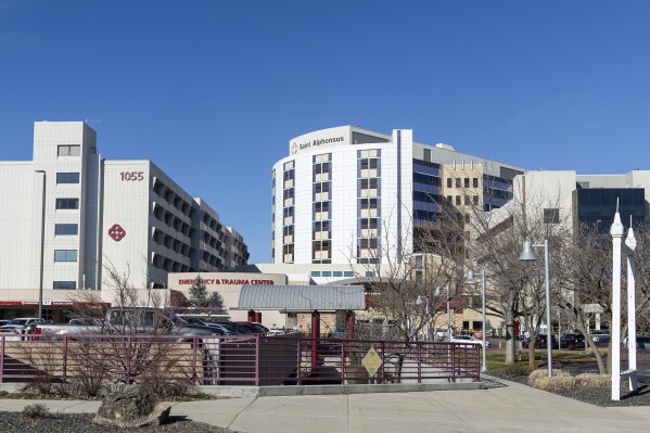 Saint Alphonsus Regional Medical Center in Boise, Idaho, is shown on Wednesday, March 20, 2024. Three Idaho corrections officers were shot as a suspect staged a brazen attack to break Skylar Meade, a prison inmate out of the Boise hospital overnight. Two of the officers were shot by the suspect early Wednesday. The third was shot and wounded by a police officer when police mistook the correctional officer for the suspect. (Sarah A. Miller/Idaho Statesman via AP)