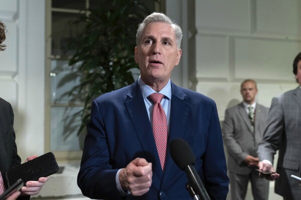 Former Speaker of the House Rep. Kevin McCarthy, R-Calif., talks to reporters after a Republican meeting at the Capitol in Washington, Thursday, Oct. 12, 2023. (AP Photo/Jose Luis Magana)