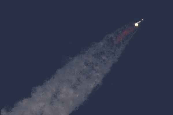 SpaceX's mega rocket Starship makes a test flight from Starbase, Texas, Tuesday, May 27, 2025. (AP Photo/Eric Gay)