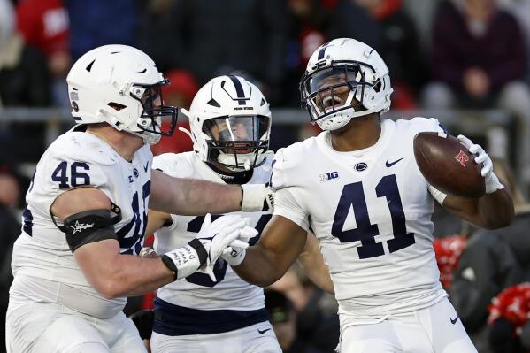 Penn State linebacker Kobe King (41) reacts to scoring a touchdown after recovering a Rutgers fumble during the first half of an NCAA college football game Saturday, Nov. 19, 2022, in Piscataway, N.J. (AP Photo/Adam Hunger)