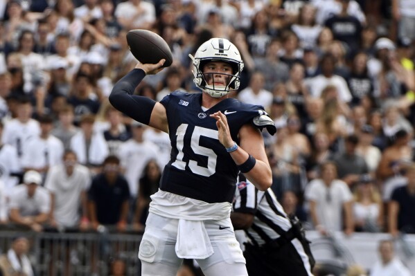 Penn State quarterback Drew Allar (15) looks to pass during the first half of an NCAA college football game against Delaware, Saturday, Sept. 9, 2023, in State College, Pa. (AP Photo/Barry Reeger)