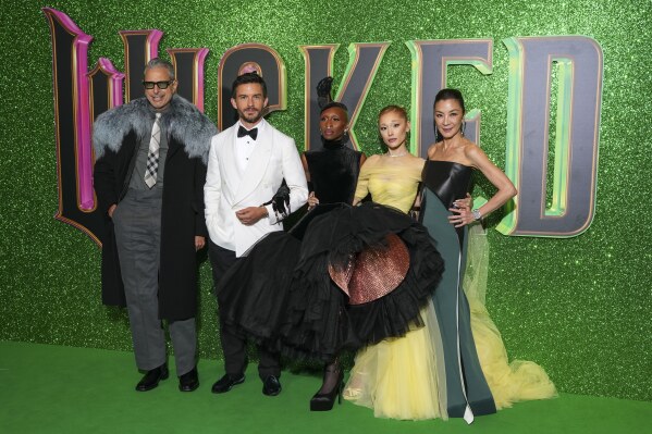 Jeff Goldblum, from left, Jonathan Bailey, Cynthia Erivo, Ariana Grande and Michelle Yeoh pose for photographers upon arrival at the premiere of the film 'Wicked' on Monday, Nov. 18, 2024, in London. (Photo by Scott A Garfitt/Invision/AP)