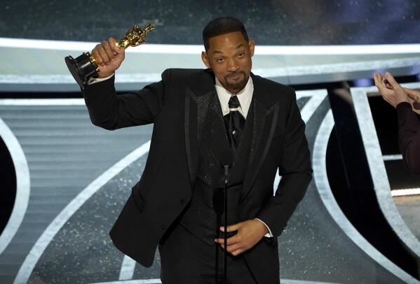 Will Smith accepts the award for best performance by an actor in a leading role for "King Richard" at the Oscars on Sunday, March 27, 2022, at the Dolby Theatre in Los Angeles. (AP Photo/Chris Pizzello)