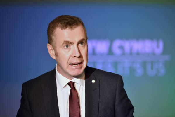 Britain's Plaid Cymru leader Adam Price speaks during the launch of his party's manifesto in Nantgarw, Wales, Friday Nov. 22, 2019. The leader of Wales’ pro-independence political party has resigned after an inquiry found it was riddled with bullying and misogyny. Adam Price said he was stepping down as leader of Plaid Cymru after a meeting of the party executive late Wednesday May 10, 2023. (Ben Birchall/PA via AP)