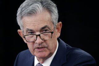 FILE - In this Wednesday, Sept. 18, 2019 file photo, Federal Reserve Board Chair Jerome Powell speaks at a news conference following a two-day meeting of the Federal Open Market Committee in Washington. A peculiar thing is happening in financial markets this week _ a corner of the financial system where banks and others go for billions of dollars in short-term loans is suddenly in need of cash. To that end, the Federal Reserve has stepped in to inject about $200 billion into the market over the past three days, with plans for another $75 billion on Friday. (AP Photo/Patrick Semansky, File)