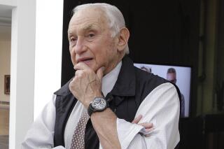 FILE - This Sept. 19, 2014 file photo shows retail mogul Leslie Wexner, at the Wexner Center for the Arts in Columbus, Ohio. A review released by Ohio State University on Thursday, April 9, 2020 identified $336,000 in donations and pledges that the university received from Jeffrey Epstein and his foundation, a sum the school said it was donating immediately to fight human trafficking. (AP Photo/Jay LaPrete, File)