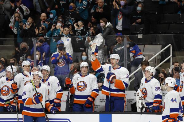 New York Islanders defenseman Zdeno Chara waves to the crowd as he is acknowledged for breaking Chris Chelios' league record for games played by a defenseman, during the first period of the team's NHL hockey game against San Jose Sharks in San Jose, Calif., Thursday, Feb. 24, 2022. (AP Photo/Josie Lepe)