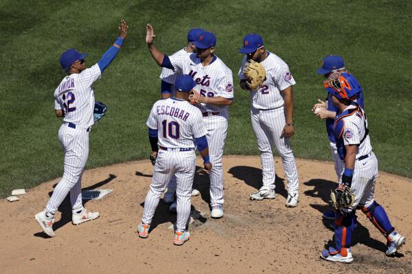 Escobar homers again, Carrasco pitches Mets past Rangers 4-1