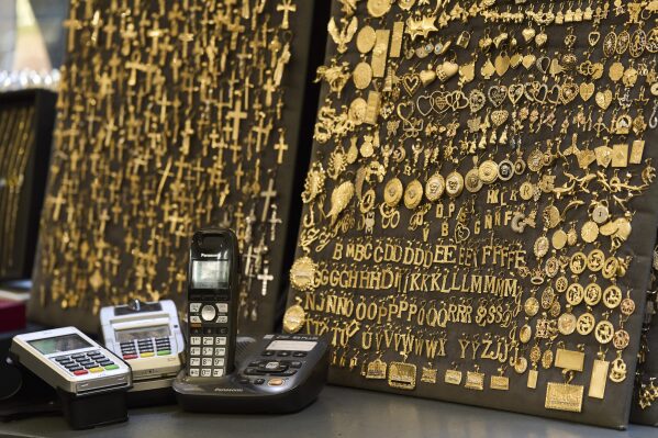 Gold jewelry are displayed for sale at V&P Jewelry in the St. Vincent Jewelry Center in the Jewelry District of Los Angeles in Los Angeles, Wednesday, April 30, 2025. (AP Photo/Jae C. Hong)